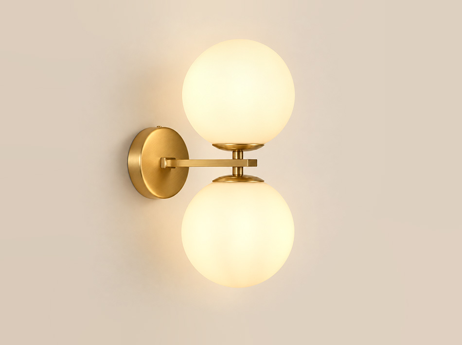 Avalon brushed gold wall sconce with two spherical white glass shades | Wall Lamps Dubai
