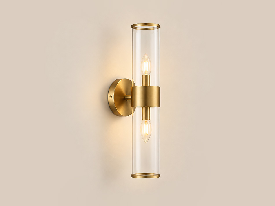 Alora brass wall sconce with elongated clear glass cylinder and two light sources | Wall Lights Dubai